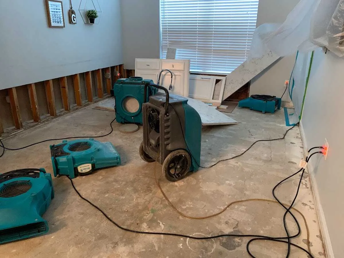 Dehumidifier in flood-cut room for Water Damage Restoration in Rusk